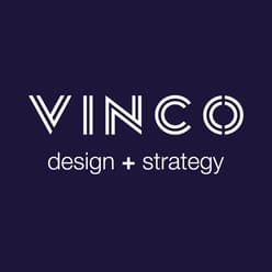 The image features the word "VINCO" in bold, modern typography, with the letters "V" and "N" featuring diagonal lines. Below, the text reads "design + strategy" in a smaller, simpler font. The background is a deep navy blue, providing a strong contrast to the white text. The overall design is clean and minimalistic, conveying a professional and contemporary aesthetic.