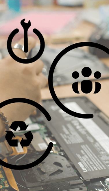 A person’s hand is seen working on a laptop, which is partially disassembled on a wooden table. The background is blurred, indicating a workspace setting. Three overlapping circular icons are featured prominently in the foreground. The top icon shows a wrench, representing repair. The left icon displays a recycling symbol, signifying sustainability. The right icon depicts three figures, symbolising collaboration or community.