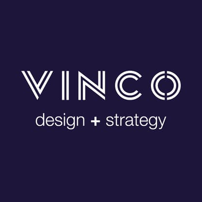 The image features the word "VINCO" in bold, modern typography, with the letters "V" and "N" featuring diagonal lines. Below, the text reads "design + strategy" in a smaller, simpler font. The background is a deep navy blue, providing a strong contrast to the white text. The overall design is clean and minimalistic, conveying a professional and contemporary aesthetic.