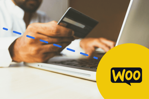 A person is holding a credit card in one hand while using a laptop with the other hand. The laptop is positioned on a light-coloured surface, and there is a yellow circular logo with the word "Woo" in black text on the bottom right corner. Blue dashed lines connect the credit card to the laptop, suggesting an online payment process.