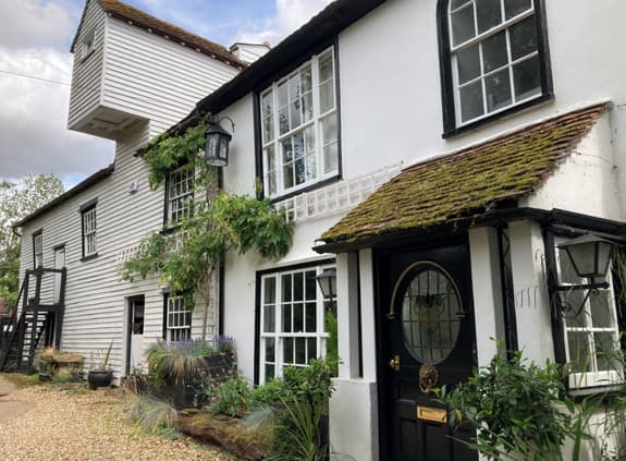 A house in Kelvedon that appears to be built before 1900, partially clad in wood