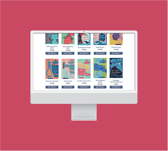 A computer monitor displays a selection of book covers on a pink background. The screen features a grid layout with eight book covers arranged in two rows. Each cover has a distinct design, showcasing vibrant colours and illustrations. Below each cover, there is text indicating the book title and price. The overall theme of the covers appears to be playful and artistic, with varied typography. A "VIEW PRODUCT" button is visible beneath each title, suggesting an online shopping context.
