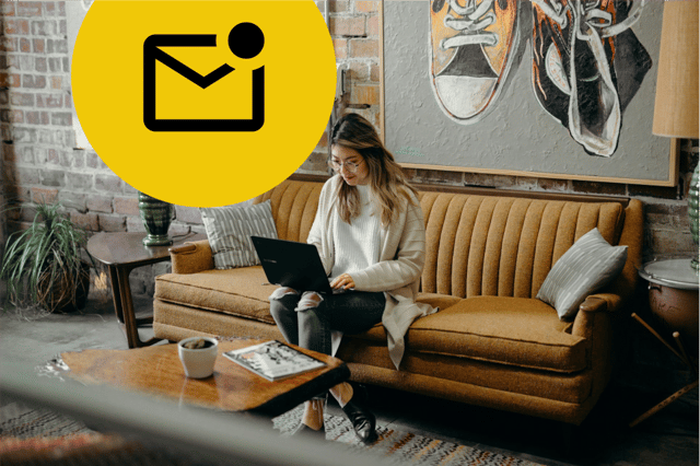 A woman sitting on a mustard sofa with a laptop on her lap in a cool looking office. At the top left of the image is a large yellow circle containing a black envelope icon with a black circle on the top right corner indicating there is unopened email