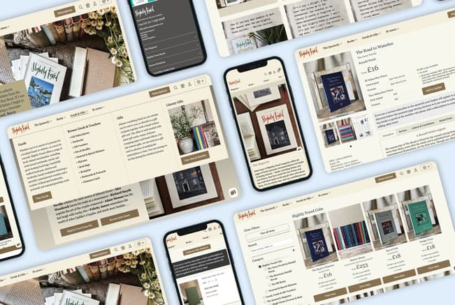 The image displays a collection of digital device screens showcasing the website for "Slightly Foxed," a literary magazine and book retailer. The layout features various sections including subscriptions, gifts, and a catalogue of books. One screen prominently displays a book titled "The Road to Waterloo" by Ronald Welch, priced at £16. Another screen highlights a collection of books with colourful covers. The background includes a textured surface with books, flowers, and stationery items, suggesting a cosy reading environment.