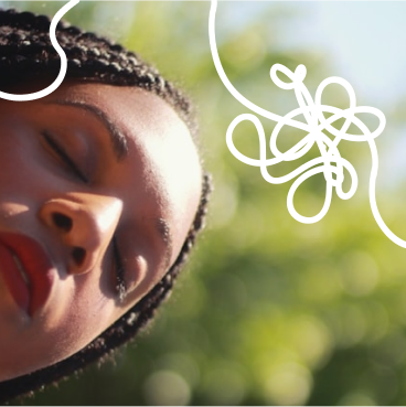 A close-up image of a person with braided hair, eyes closed and a serene expression, suggesting relaxation or contemplation. The individual has a bold red lip colour, adding vibrancy to the image. In the background, there are soft green foliage and blurred natural light, creating a calming atmosphere. Overlapping the image are whimsical white line patterns that add a creative touch without detracting from the person's features.