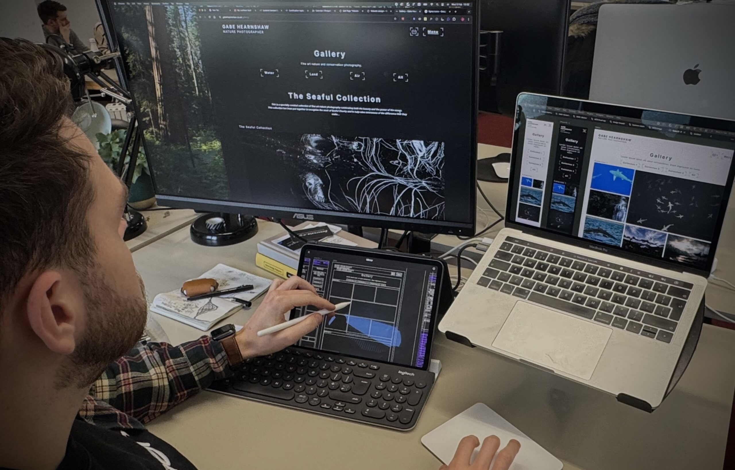 Designer working on a website wireframe and design