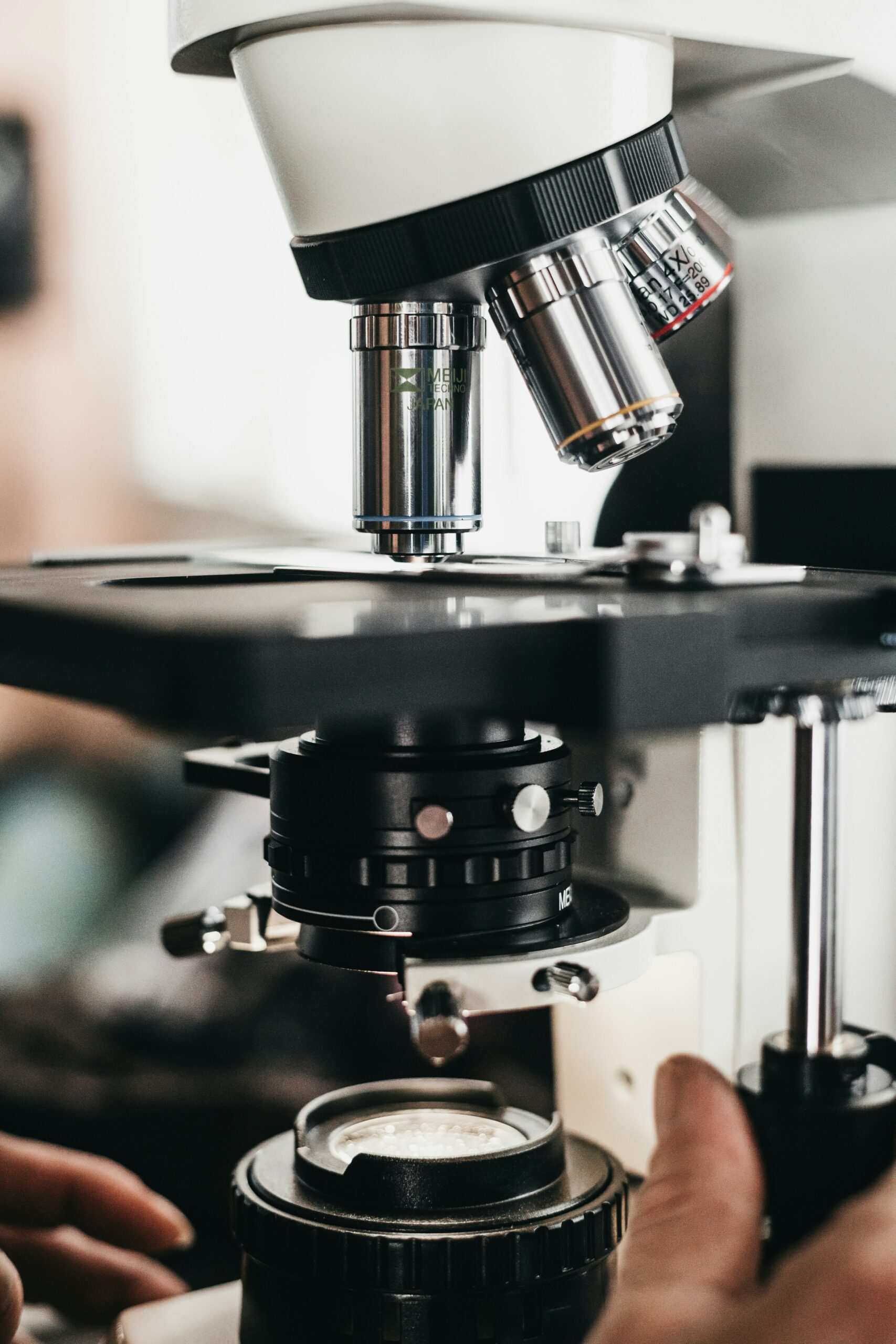 A microscope being used to examine
