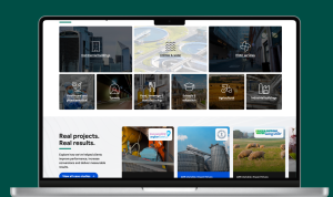 laptop showing gibbons group sector pages on website